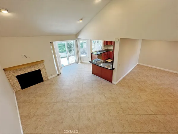 a spacious bathroom with double vanity and a mirror