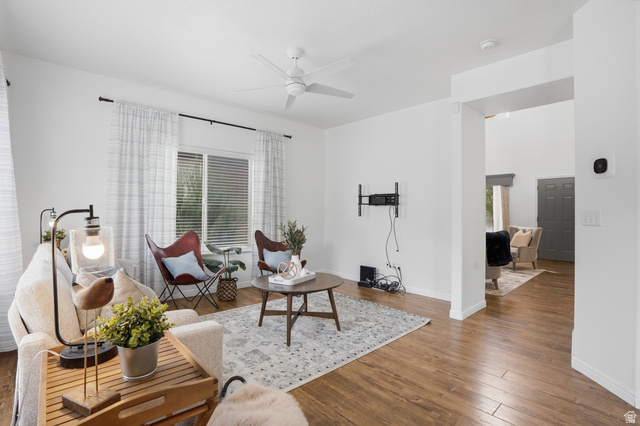 2007 Fielding Hill Lane Draper, UT 84020 - Photo 12 of 83 Spacious living area featuring wood-finish flooring, a ceiling fan, and white walls