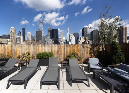 a view of a terrace with sitting area