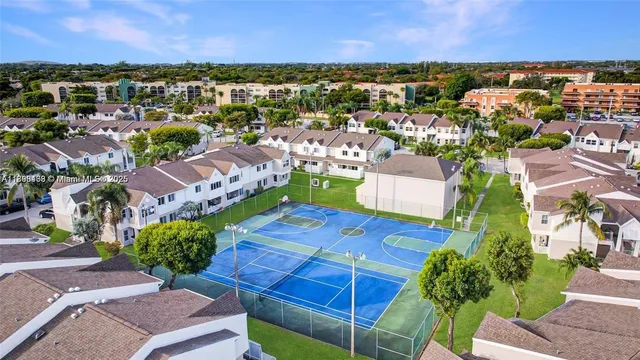 an aerial view of a house with a garden