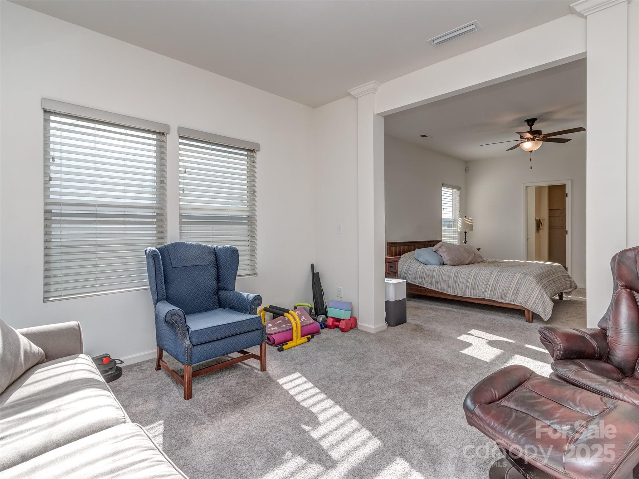 5220 Admirals Landing Lancaster, SC 29720 - Photo 19 of 48 a bedroom with furniture and a potted plant