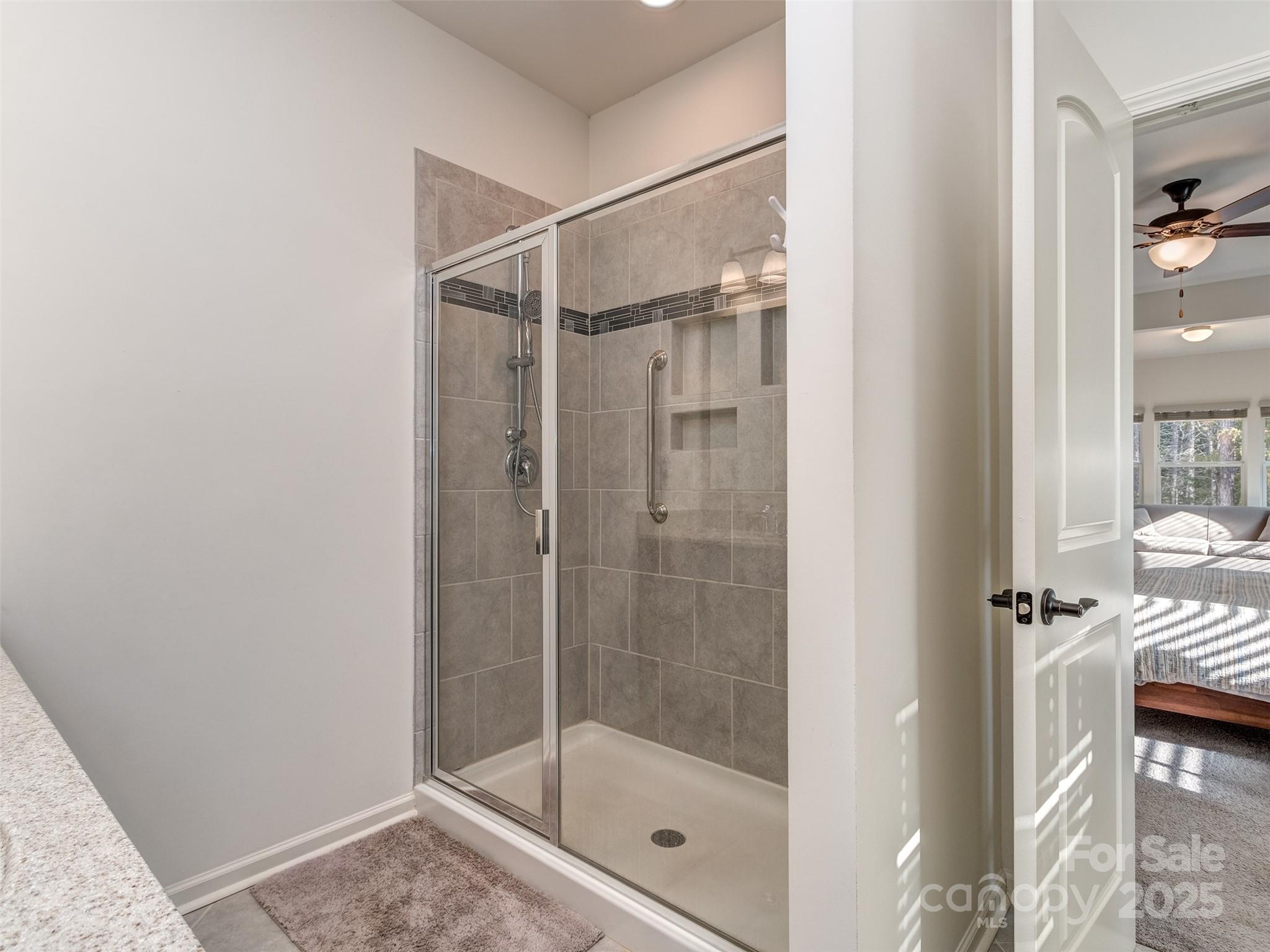 5220 Admirals Landing Lancaster, SC 29720 - Photo 21 of 48 a bathroom with a glass shower door