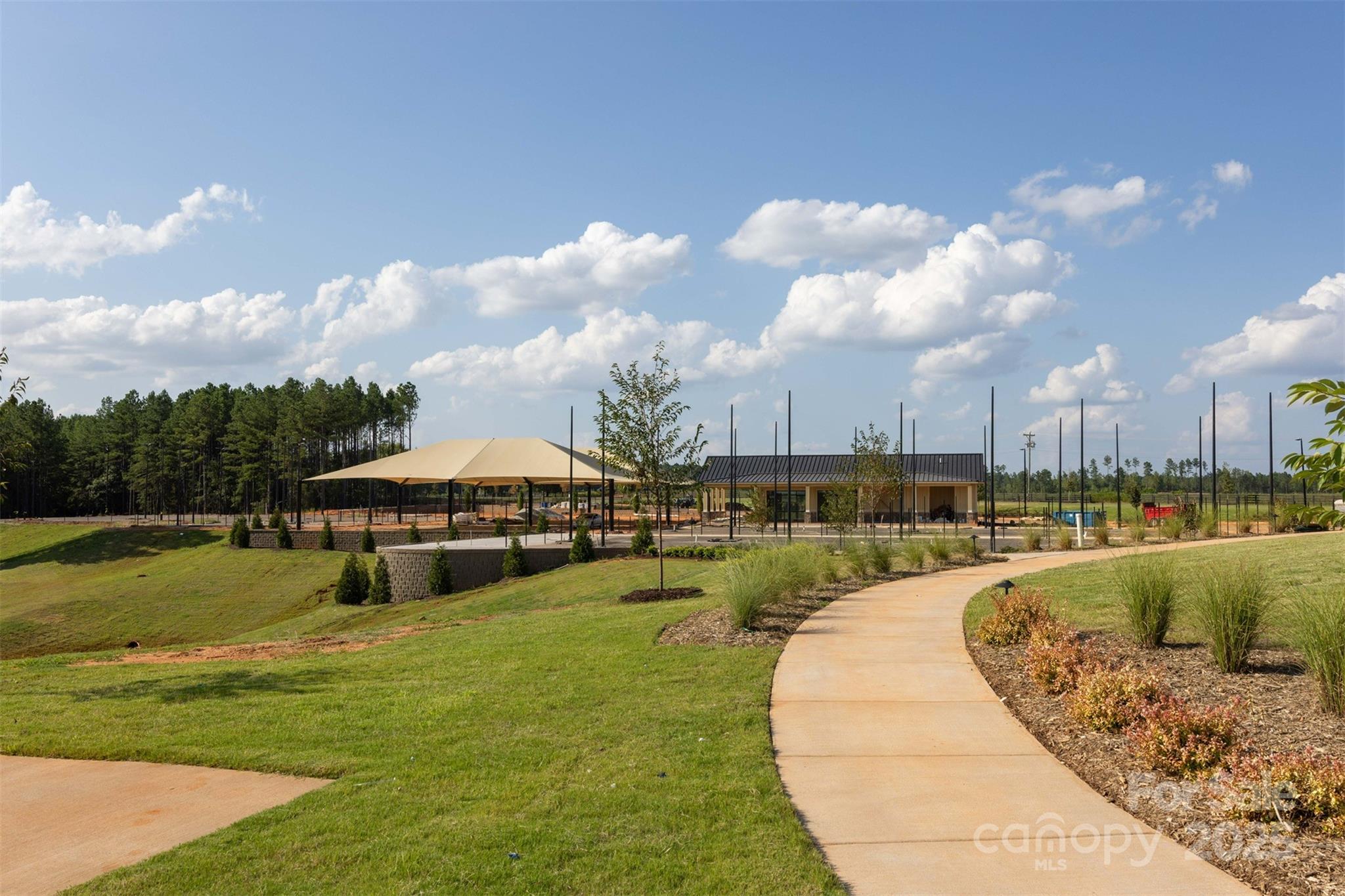 5220 Admirals Landing Lancaster, SC 29720 - Photo 44 of 48 a swimming pool with outdoor seating and yard