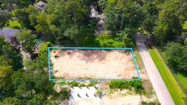 a view of swimming pool with a yard
