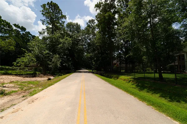 a view of swimming pool with a yard