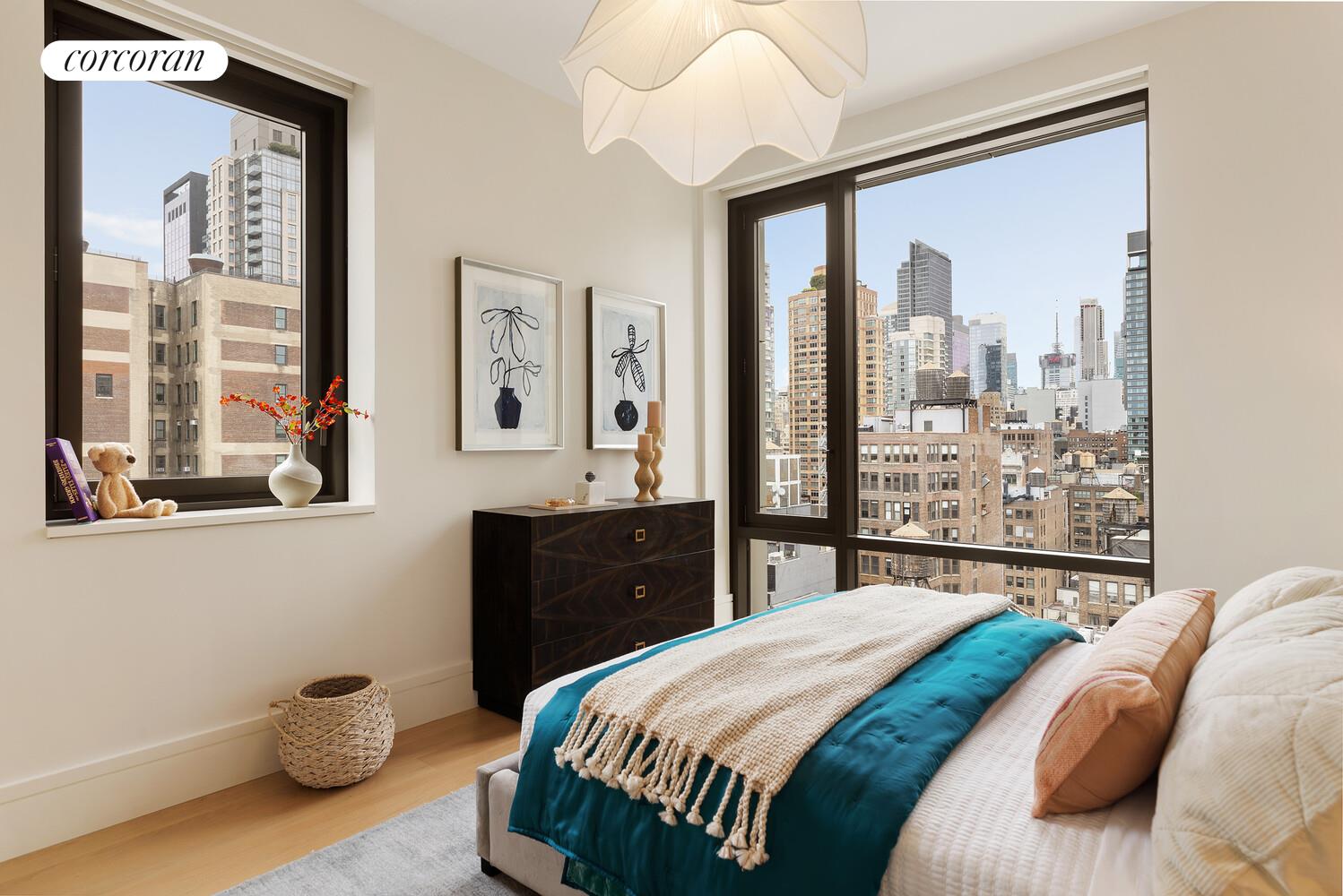 39 West 23rd Street, Unit PH20 Manhattan, NY 10010 - Photo 11 of 15 a bedroom with a bed and glass windows