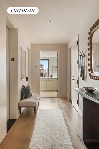 a bathroom with a double vanity sink a mirror and a shower