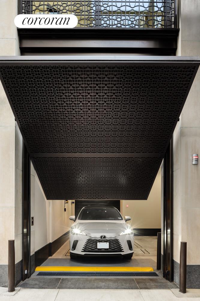 39 West 23rd Street, Unit PH20 Manhattan, NY 10010 - Photo 14 of 15 a living room with a black white checkered floor and large trees