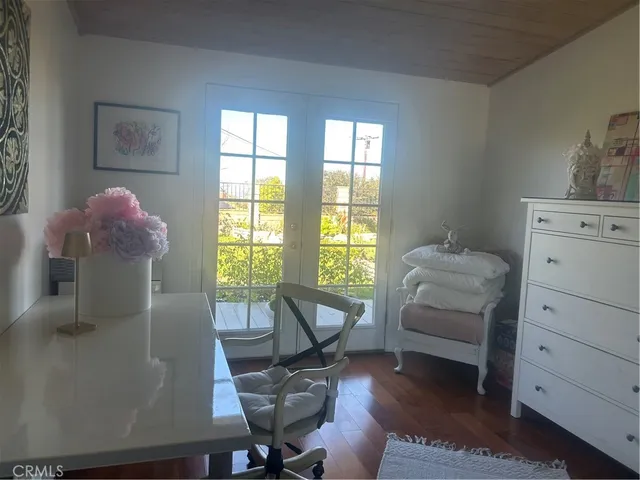 a room with a couch and a window