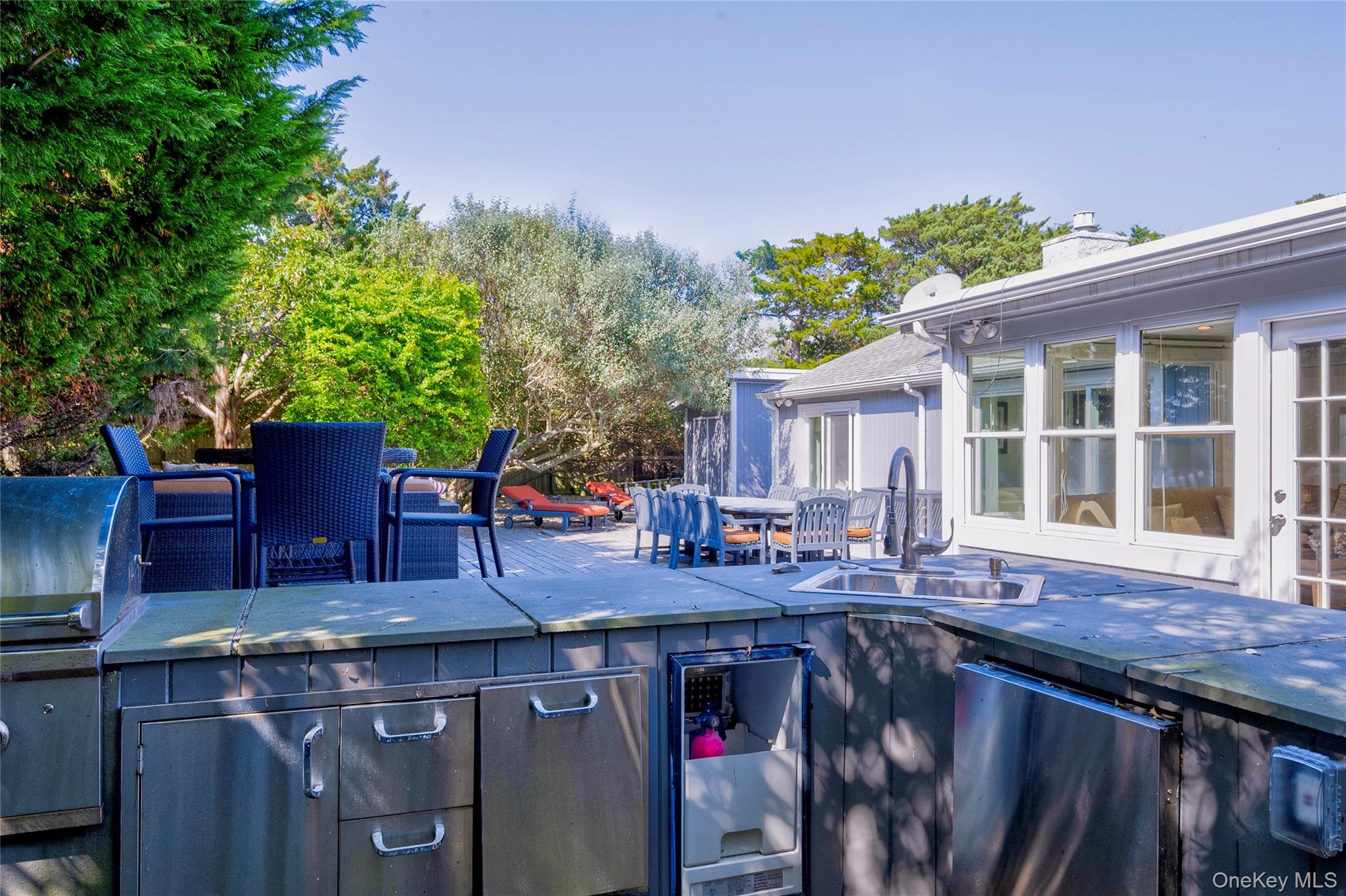 39 Sloop Walk Ocean Beach, NY 11770 - Photo 12 of 50 a view of house with outdoor seating