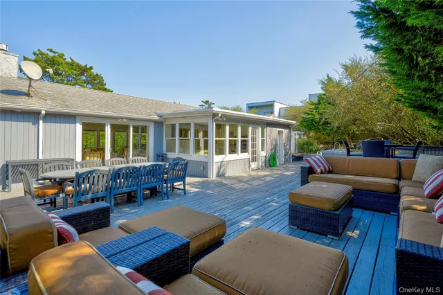 a outdoor living space with furniture and a potted plant