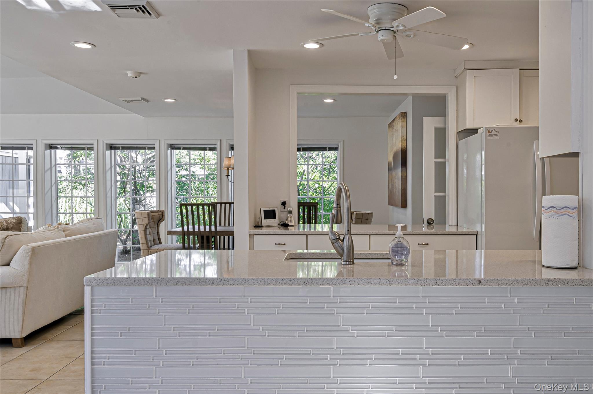 39 Sloop Walk Ocean Beach, NY 11770 - Photo 50 of 50 a dining hall with stainless steel appliances granite countertop a large window