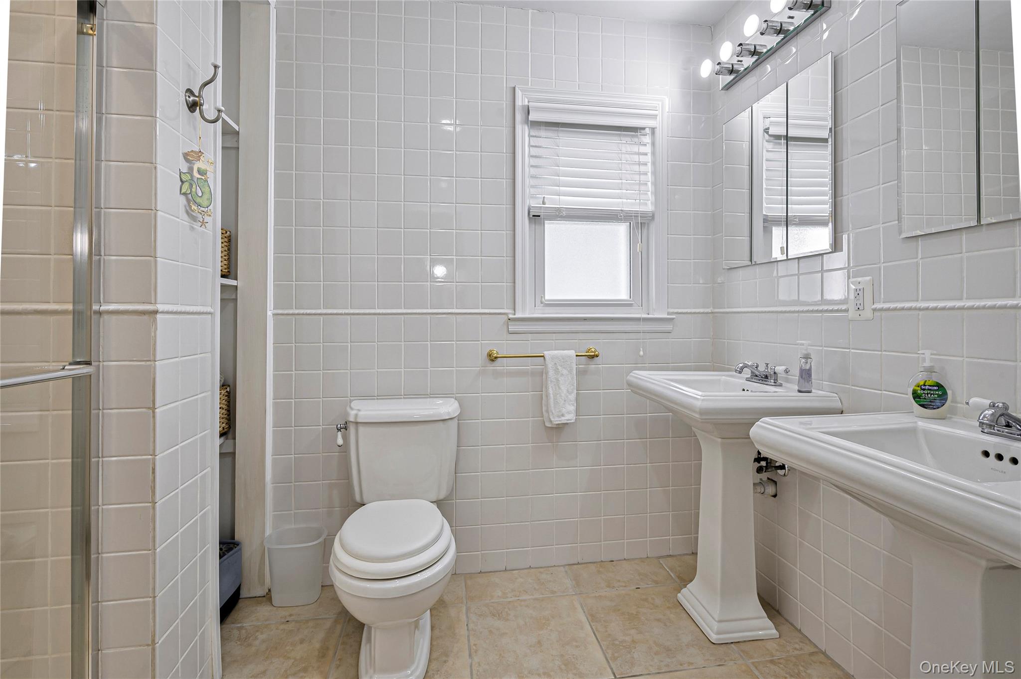 39 Sloop Walk Ocean Beach, NY 11770 - Photo 27 of 50 a bathroom with a sink toilet and shower