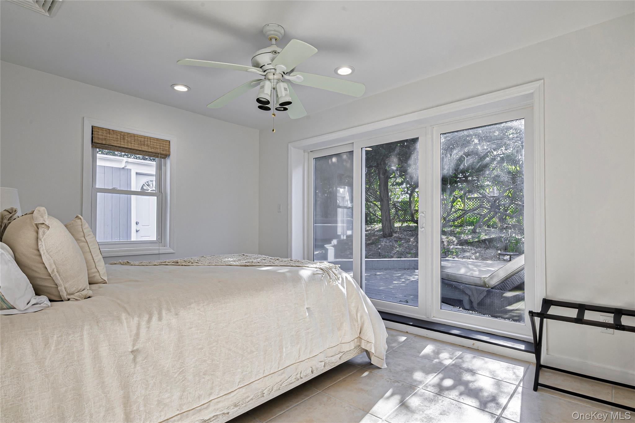 39 Sloop Walk Ocean Beach, NY 11770 - Photo 28 of 50 a bedroom with a large bed and a window