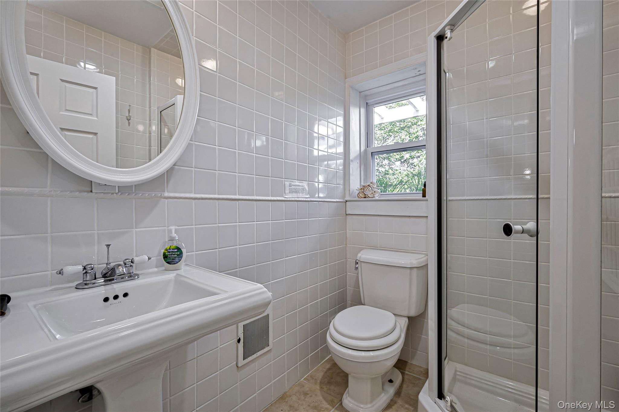 39 Sloop Walk Ocean Beach, NY 11770 - Photo 30 of 50 a bathroom with a sink a toilet and a mirror