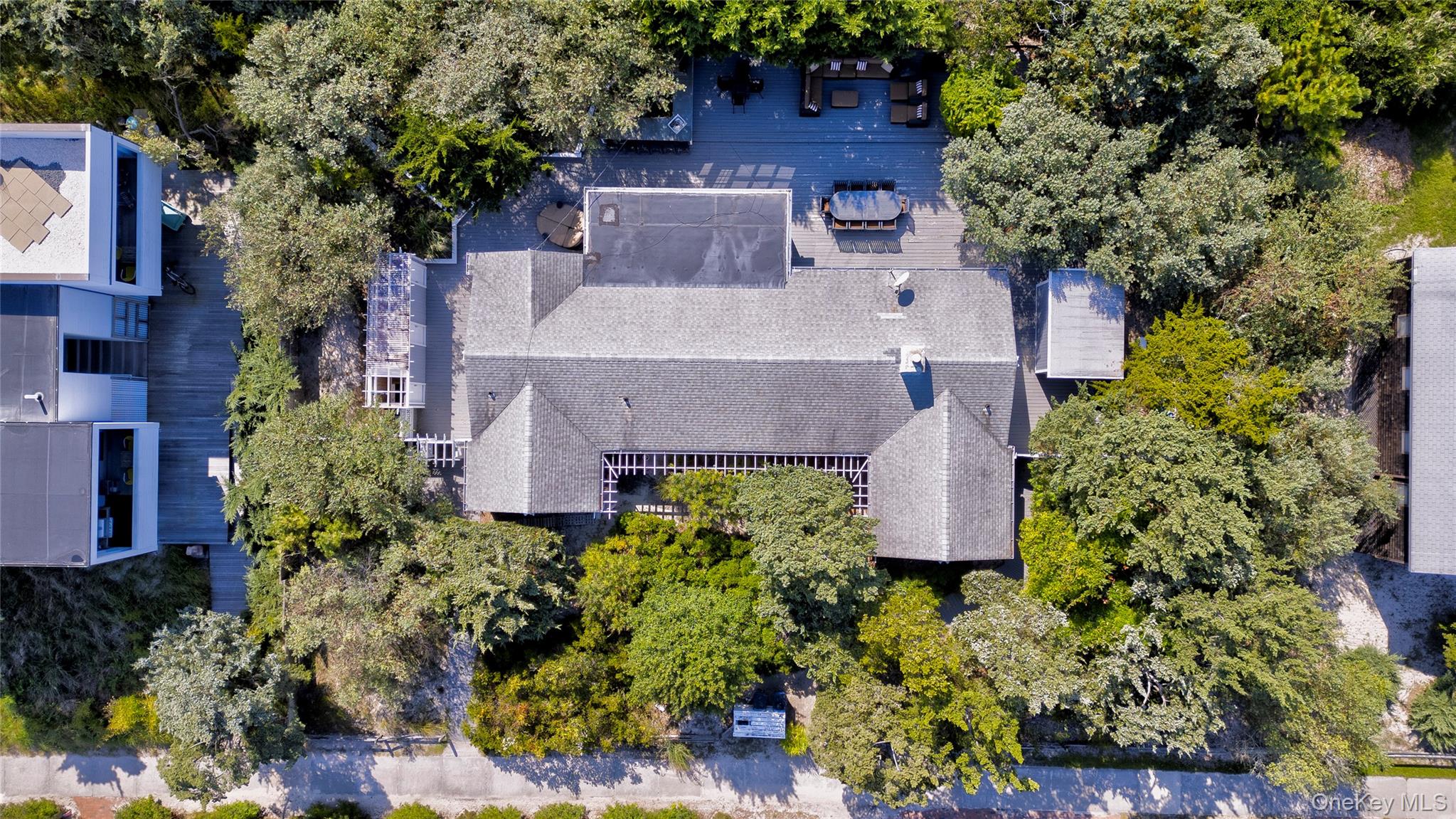 39 Sloop Walk Ocean Beach, NY 11770 - Photo 35 of 50 an aerial view of a house with a garden