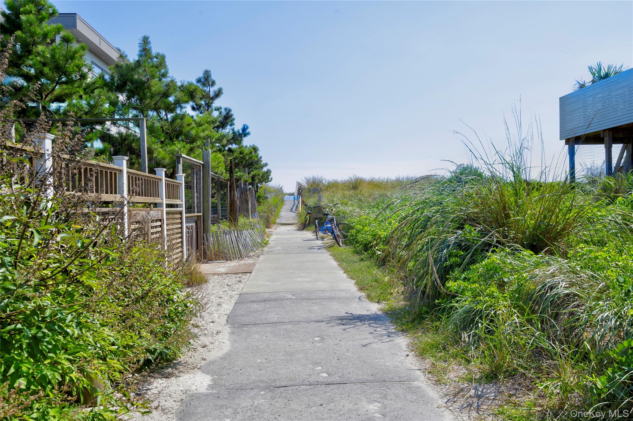 39 Sloop Walk Ocean Beach, NY 11770 - Photo 4 of 50 a view of a pathway with a house