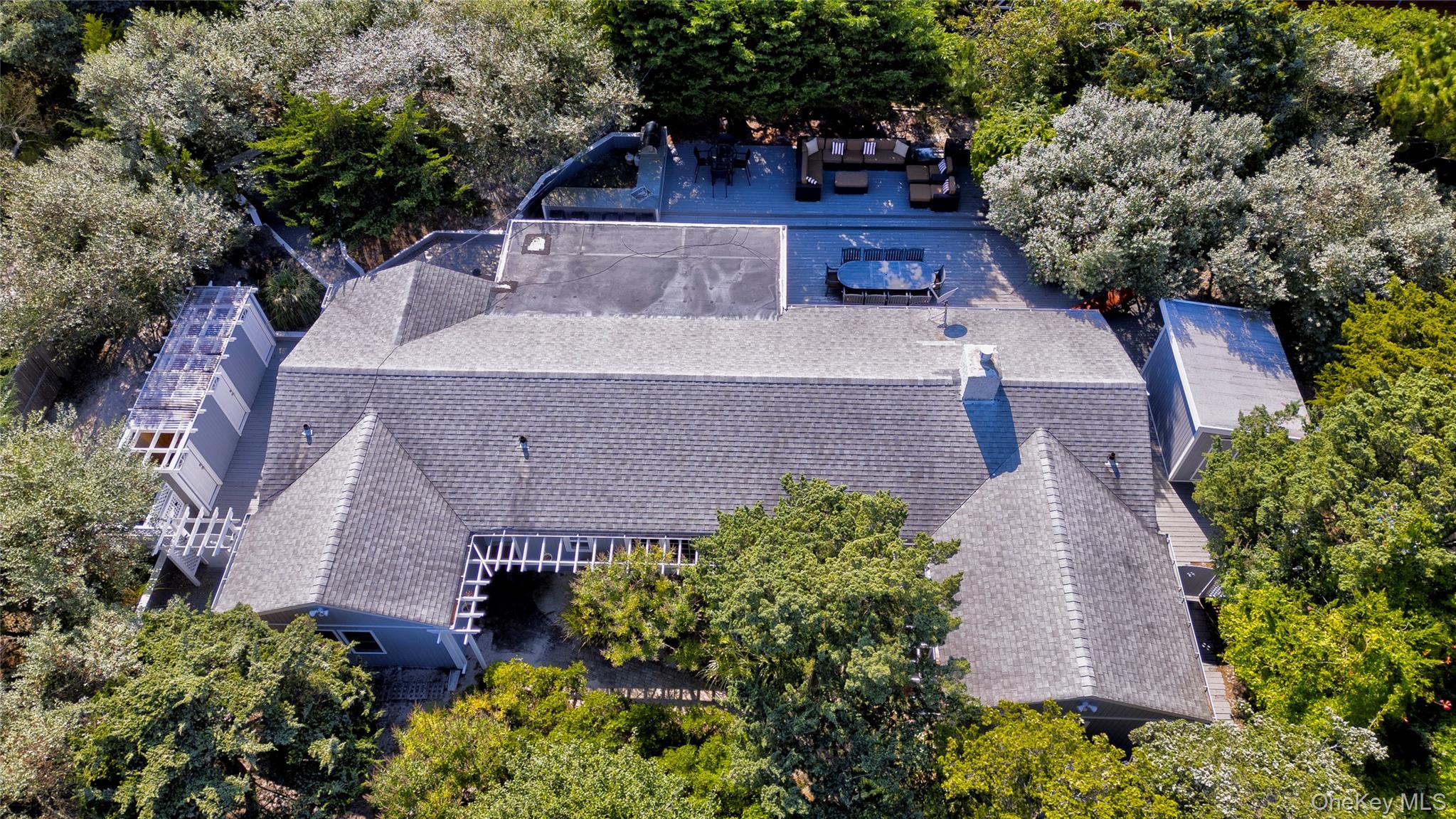 39 Sloop Walk Ocean Beach, NY 11770 - Photo 48 of 50 an aerial view of a house with a yard and garden