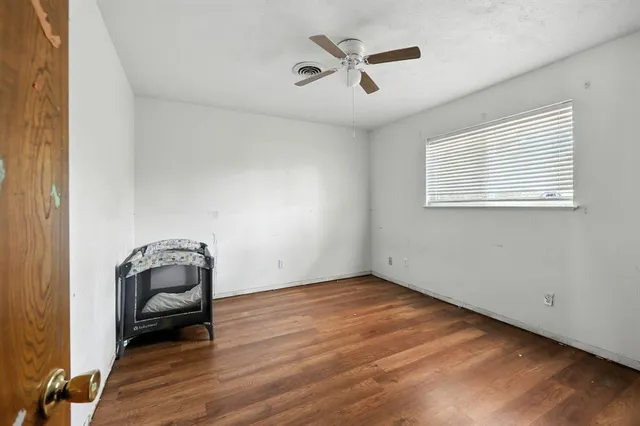 a room with a couch and a window