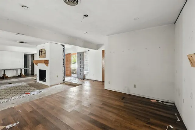 a view of a livingroom with wooden floor