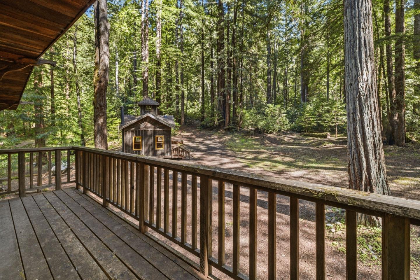 41 Back Road La Honda, CA 94020 - Photo 24 of 101 a view of a wooden balcony with trees