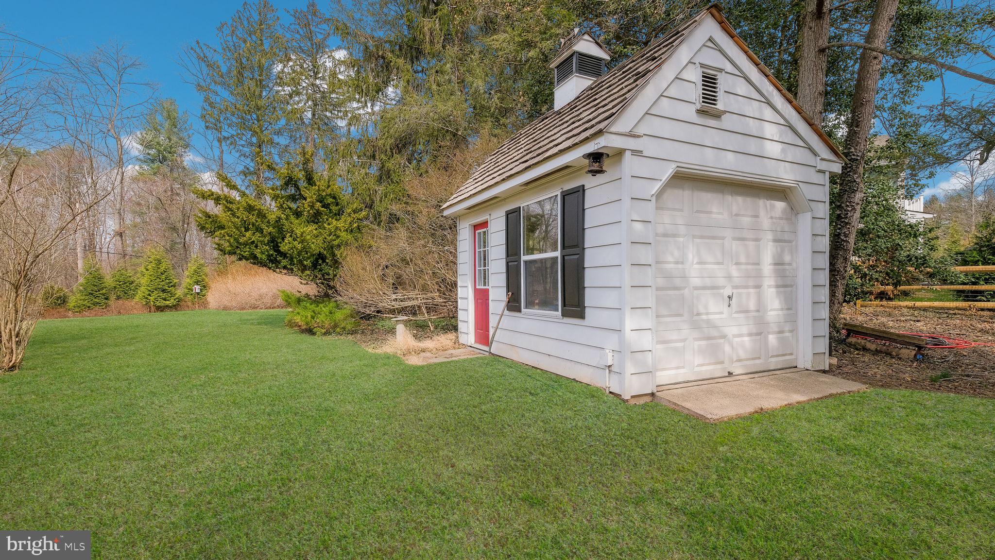 563 Pebble Hill Road Doylestown, PA 18901 - Photo 54 of 82 Detached garden shed with new cedar shake roof