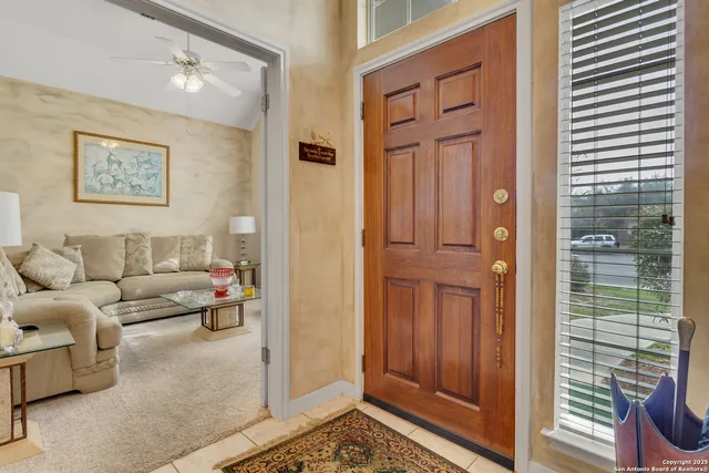 a living room with furniture and a door