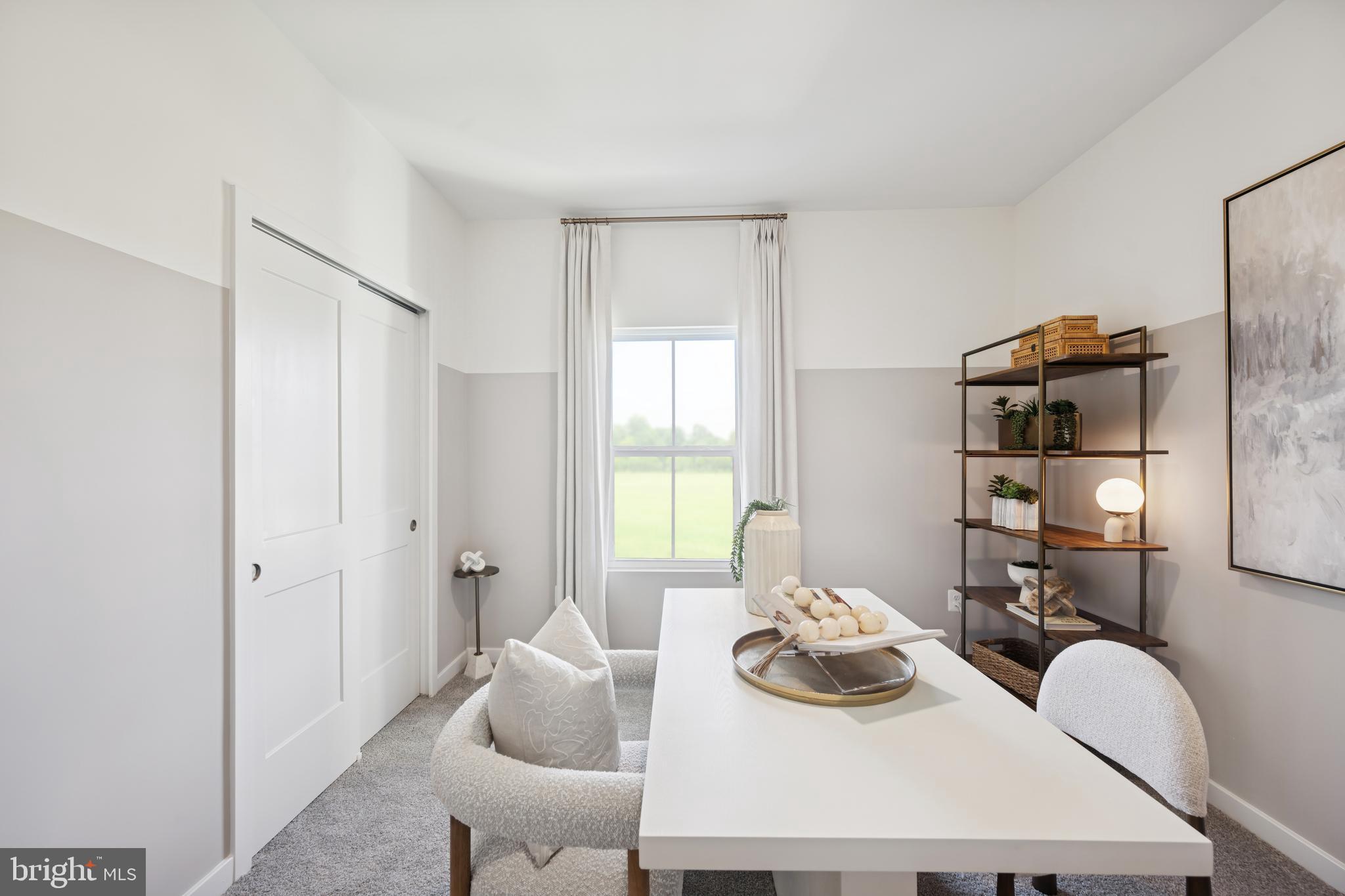 70 Thornton Avenue Ranson, WV 25438 - Photo 3 of 24 a table and chairs in a room