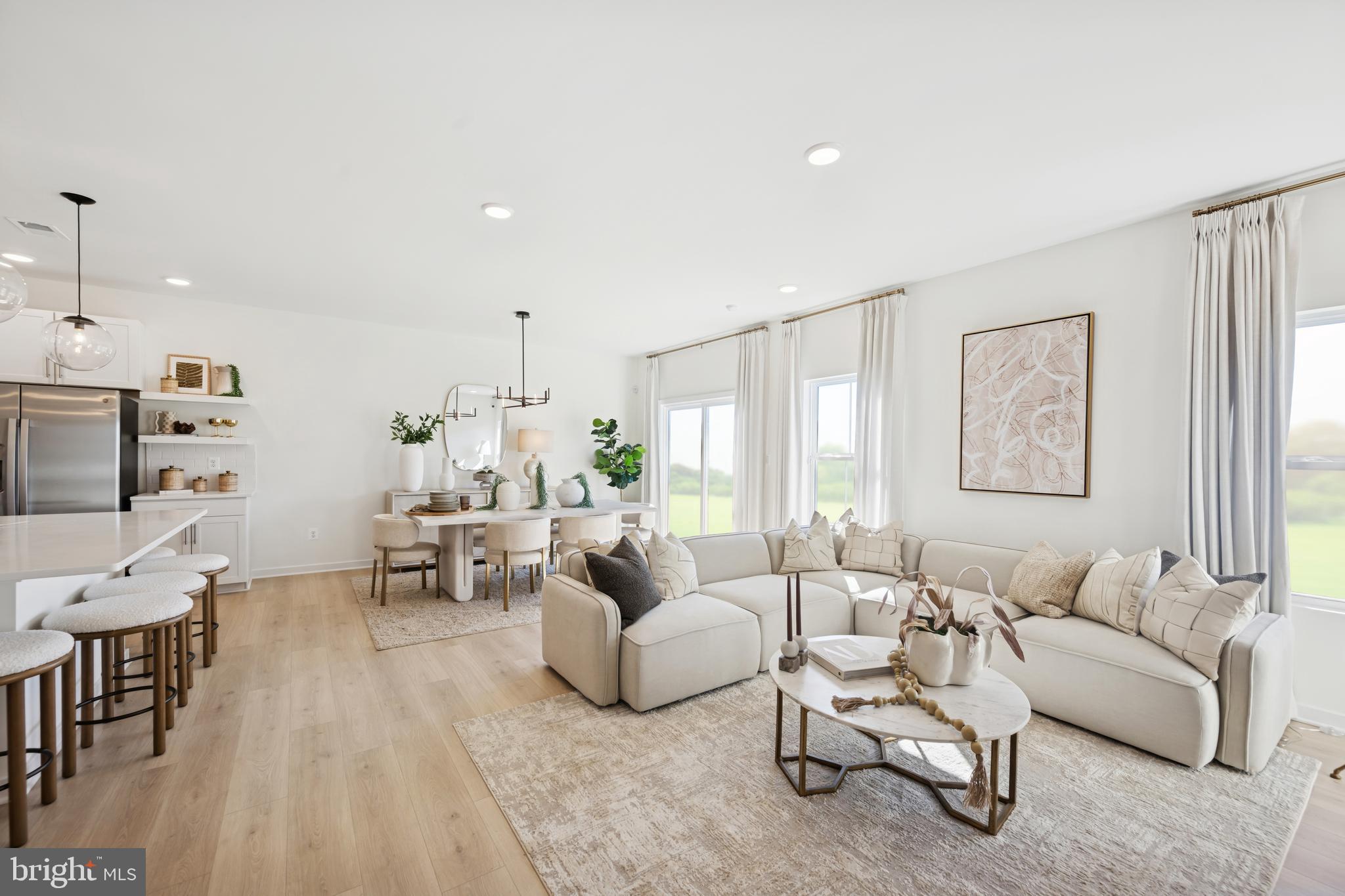 70 Thornton Avenue Ranson, WV 25438 - Photo 7 of 24 a living room with furniture and a large window
