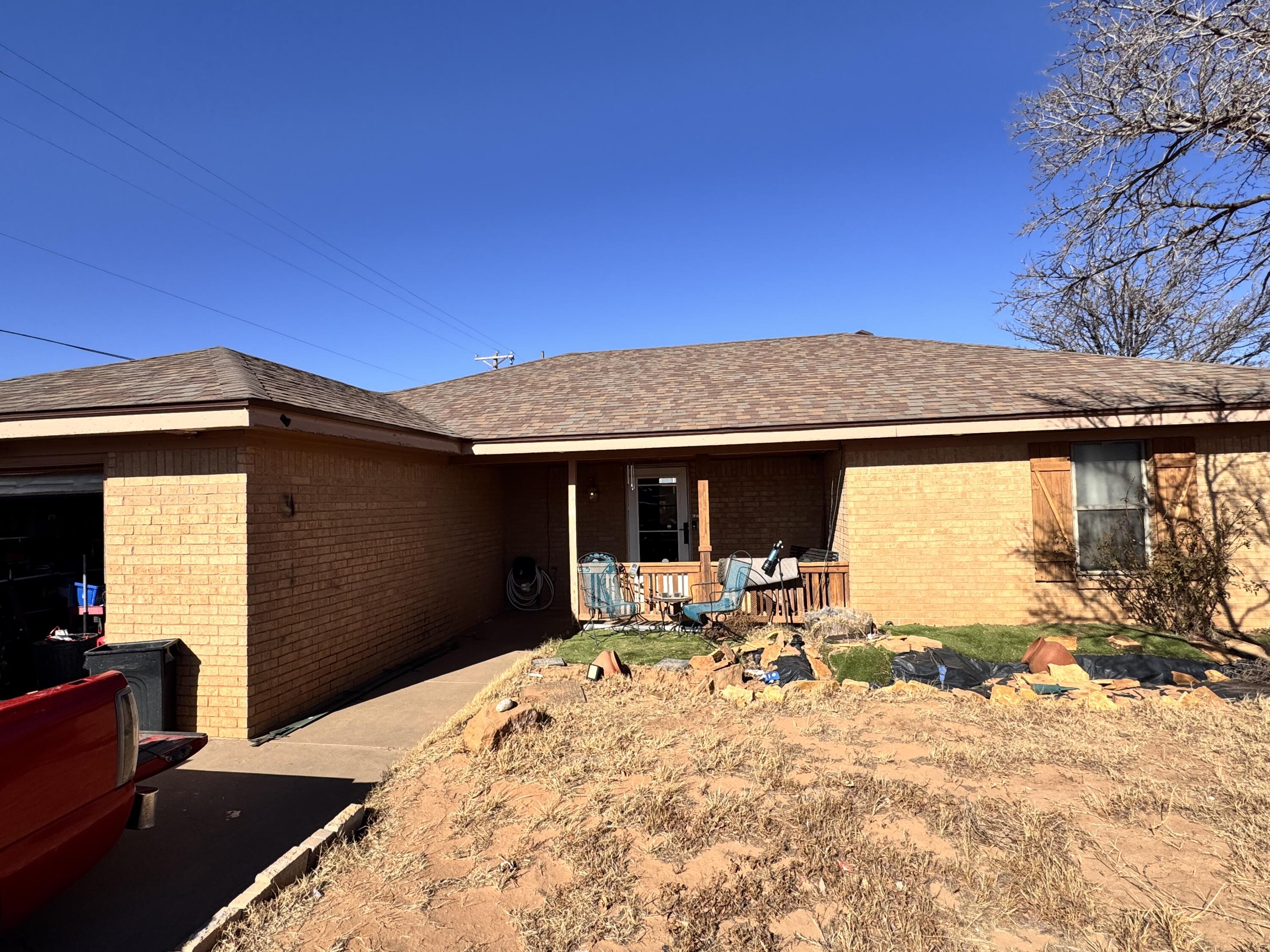 a front view of a house with patio