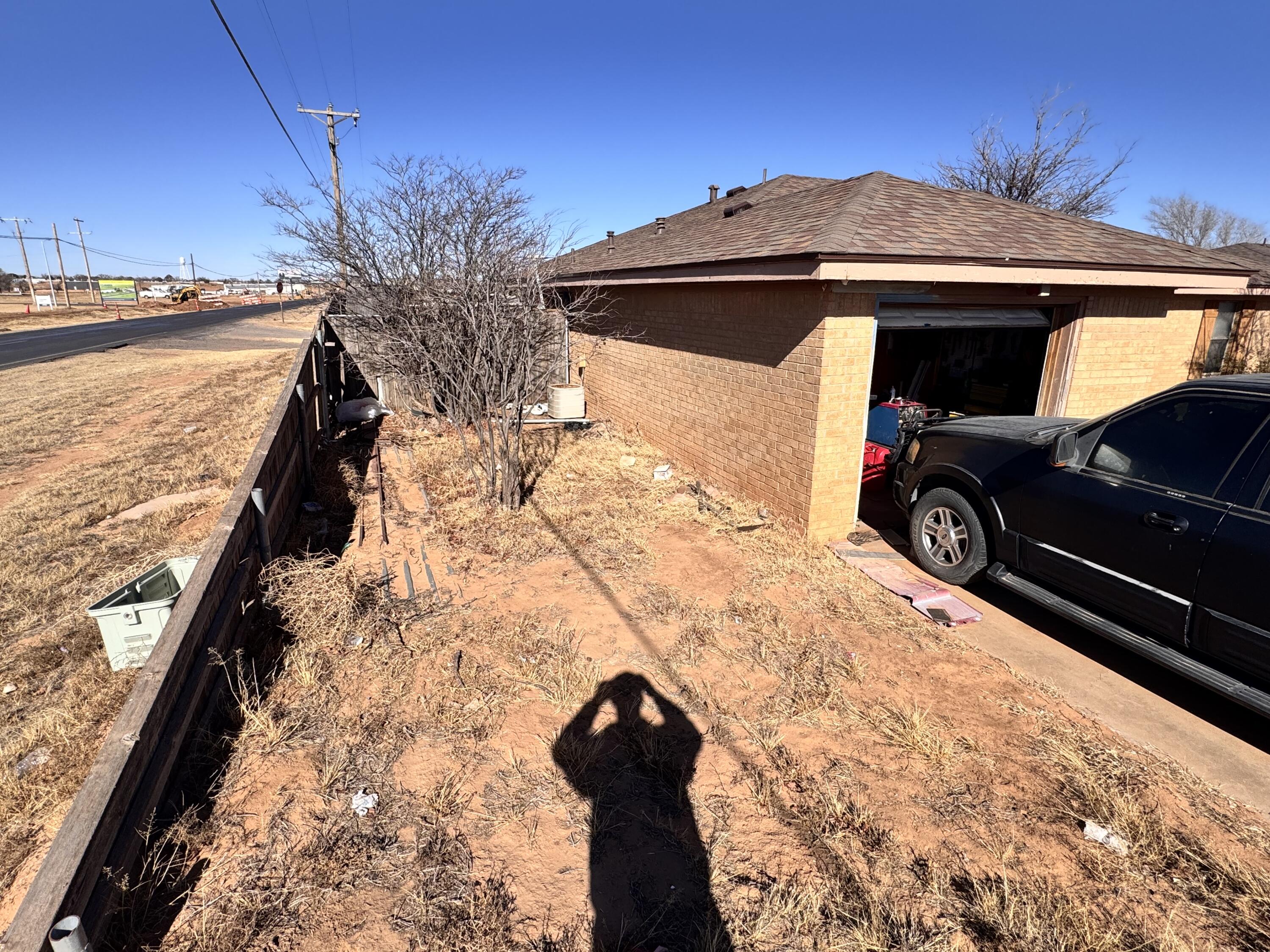 302 East 15th Street Wolfforth, TX 79382 - Photo 4 of 13 a view of outdoor space and yard