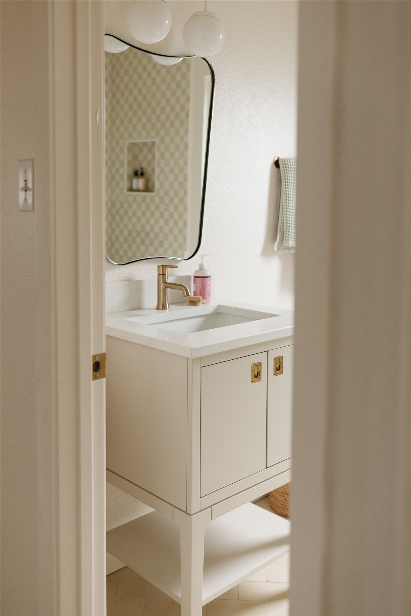 506 Central Drive Georgetown, TX 78628 - Photo 22 of 29 a bathroom with a sink vanity and mirror