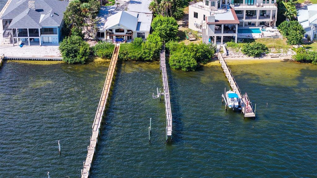 7401 Midnight Pass Road, Unit A Sarasota, FL 34242 - Photo 13 of 22 a aerial view of a house with a yard