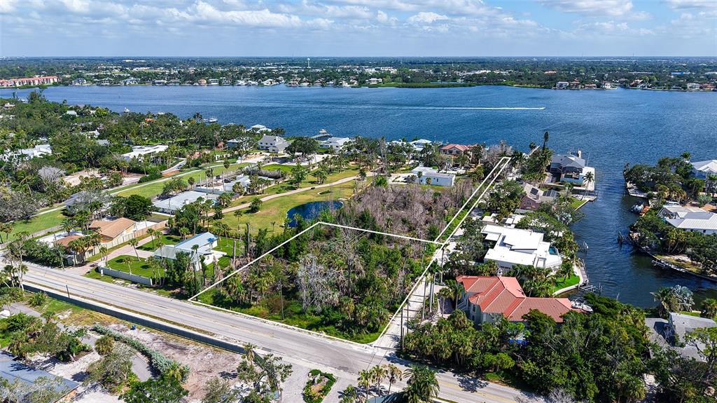 7401 Midnight Pass Road, Unit A Sarasota, FL 34242 - Photo 3 of 22 a view of a city