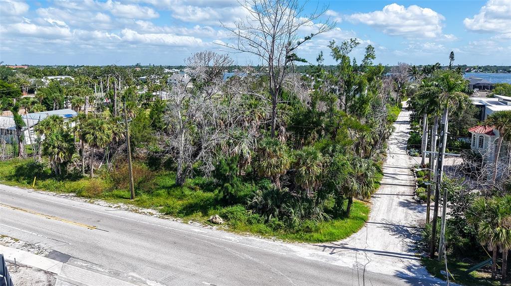 7401 Midnight Pass Road, Unit A Sarasota, FL 34242 - Photo 10 of 22 a view of a garden