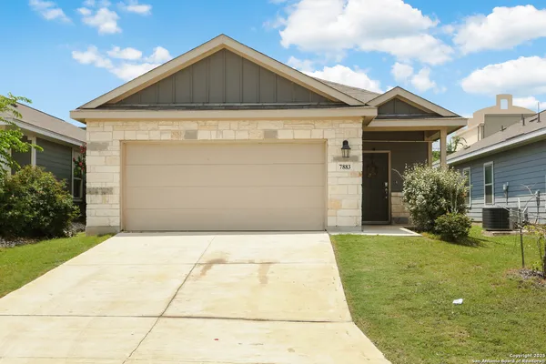 a front view of house with yard