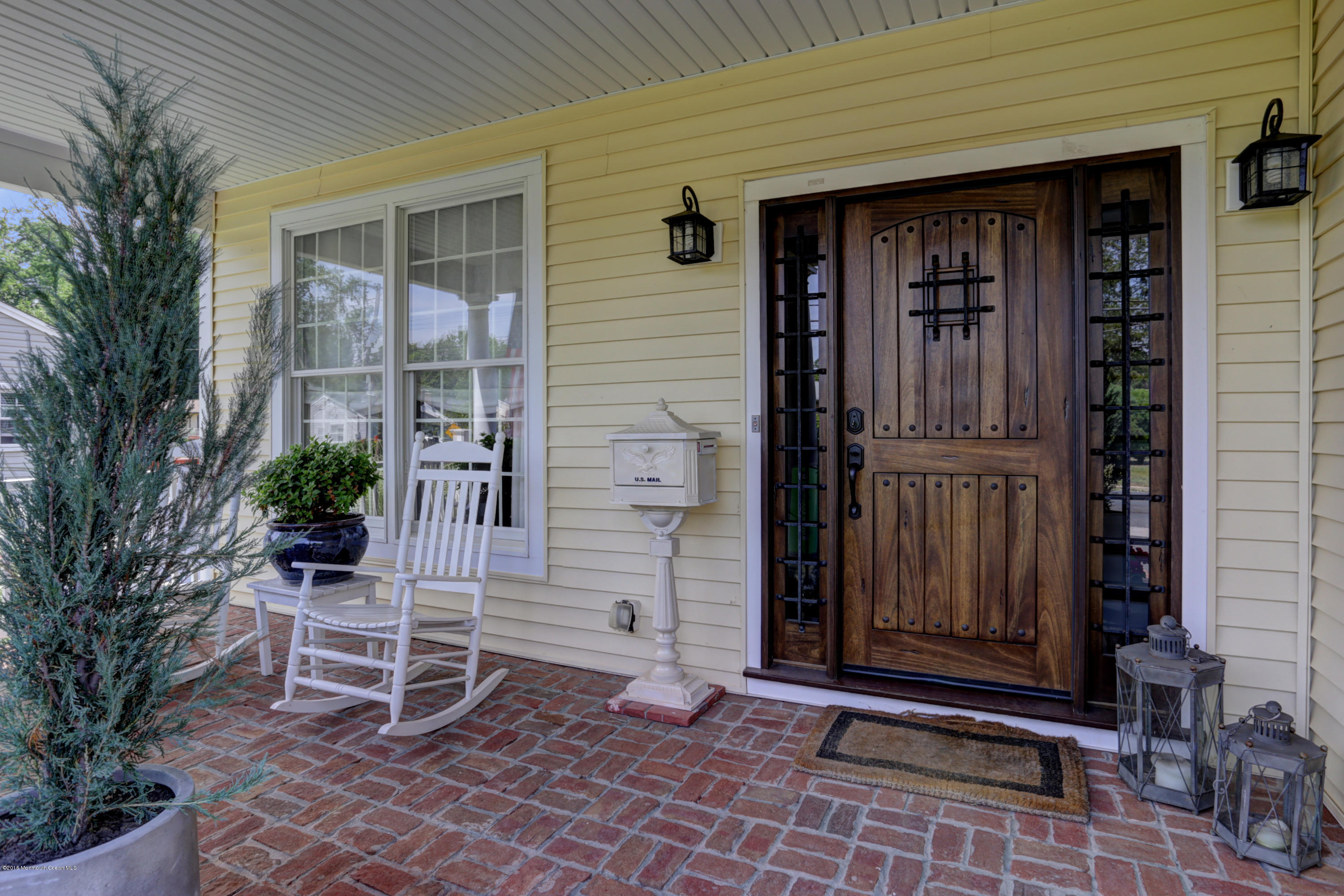 434 E Road Middletown, NJ 07718 - Photo 6 of 30 a front view of a house with a porch