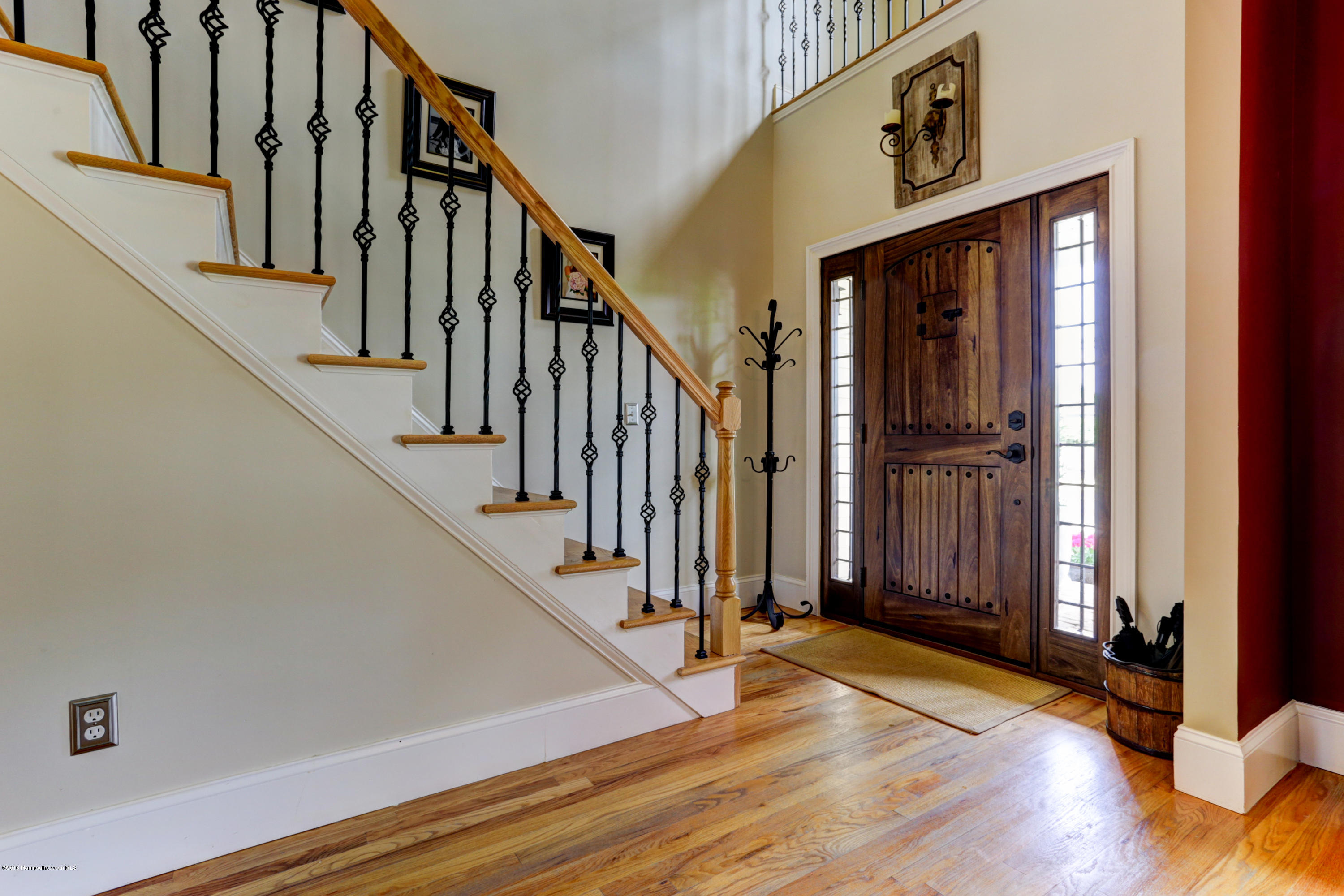 434 E Road Middletown, NJ 07718 - Photo 7 of 30 a view of an entryway with wooden floor and door