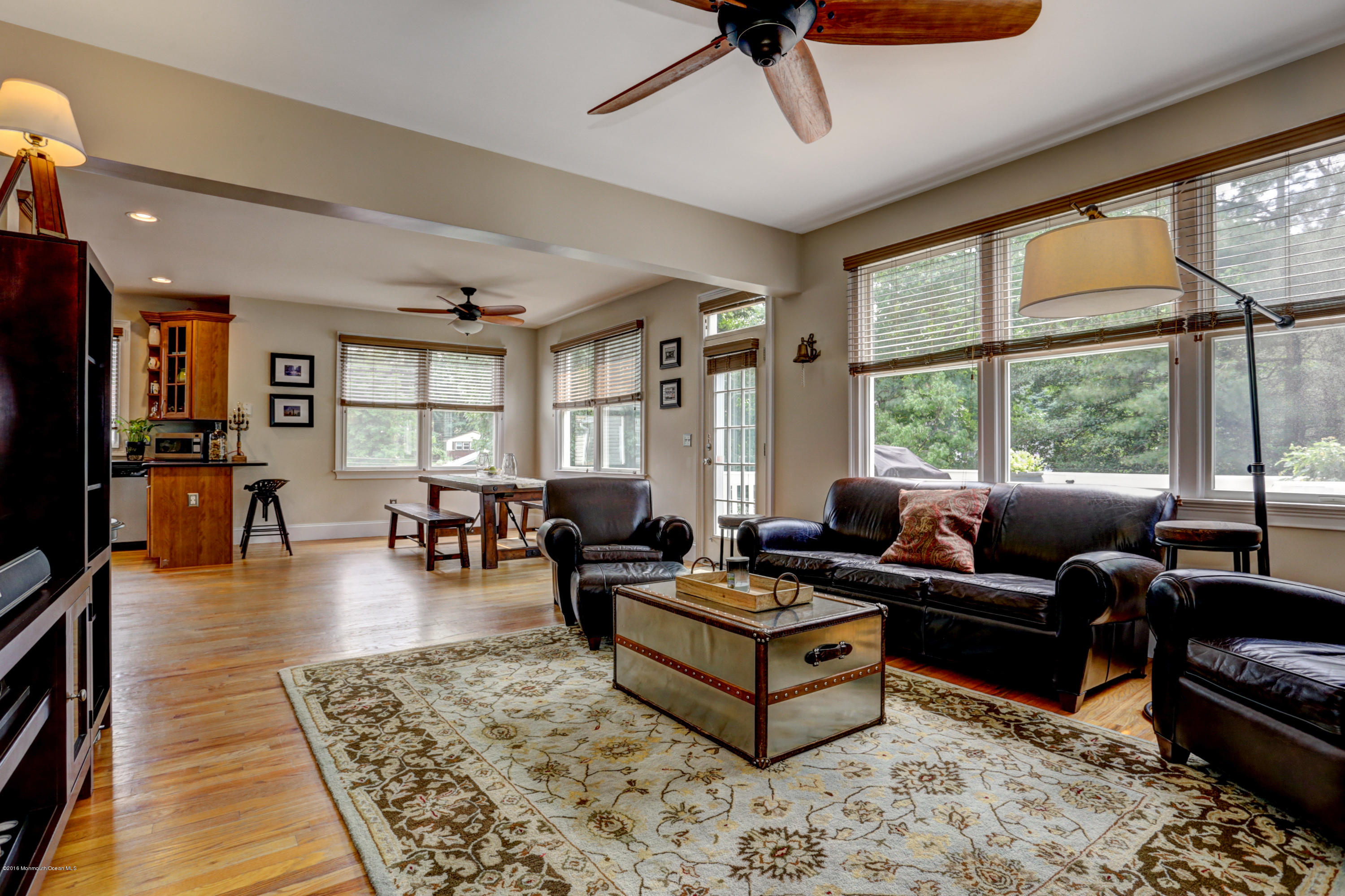 434 E Road Middletown, NJ 07718 - Photo 10 of 30 a living room with furniture a rug and a large window