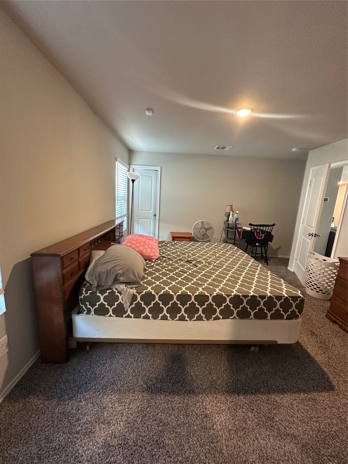 411 Armstrong Street Houston, TX 77029 - Photo 6 of 7 a bedroom with a bed and window