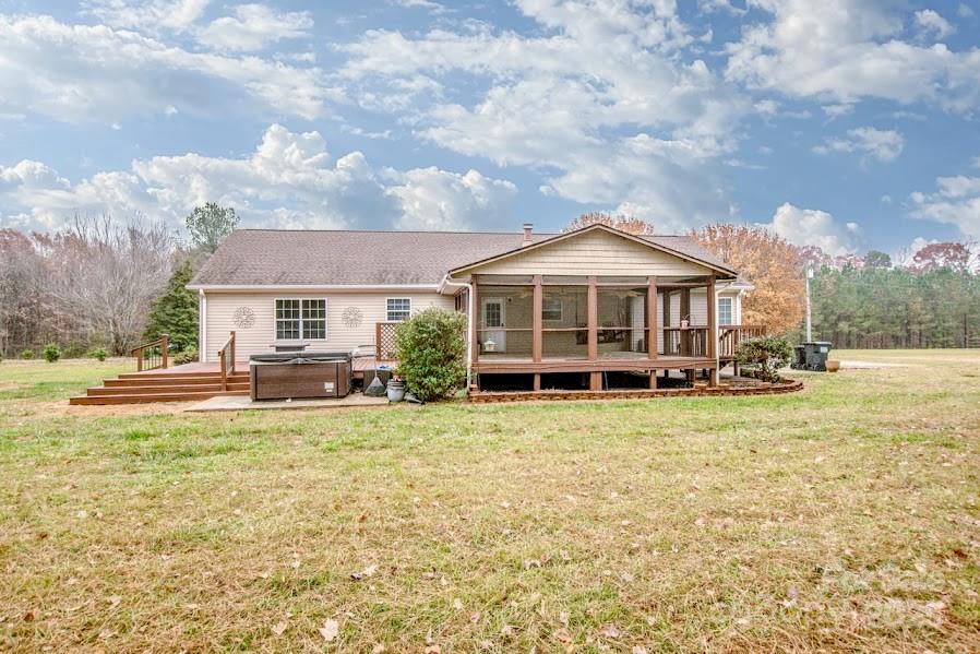 224 Stewart Rock Road Stony Point, NC 28678 - Photo 35 of 41 a view of a house with swimming pool and sitting area