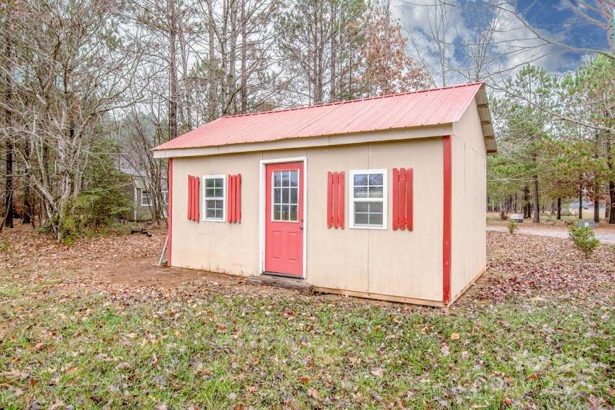 224 Stewart Rock Road Stony Point, NC 28678 - Photo 39 of 41 a view of a house with yard and tree s