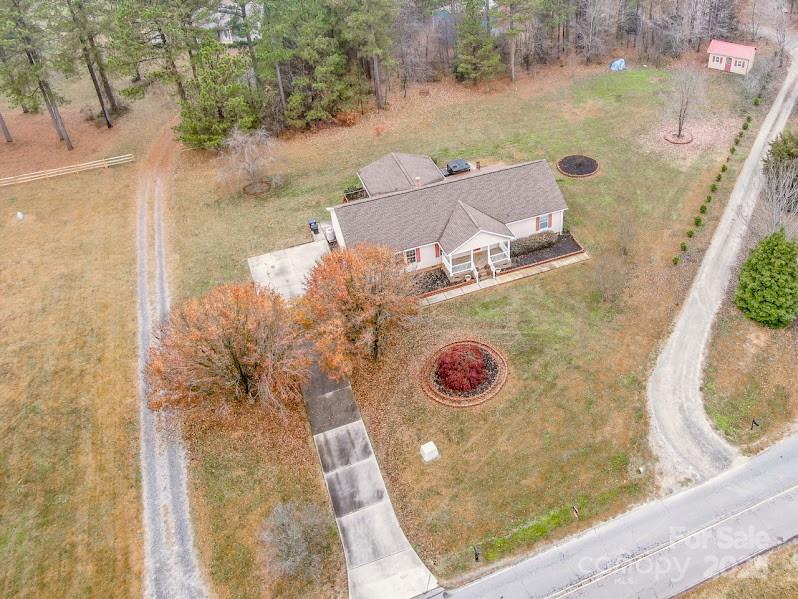 224 Stewart Rock Road Stony Point, NC 28678 - Photo 4 of 41 an aerial view of a house with a yard
