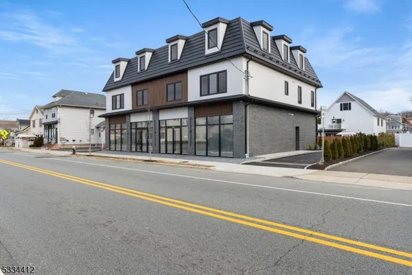 a view of a building with a street