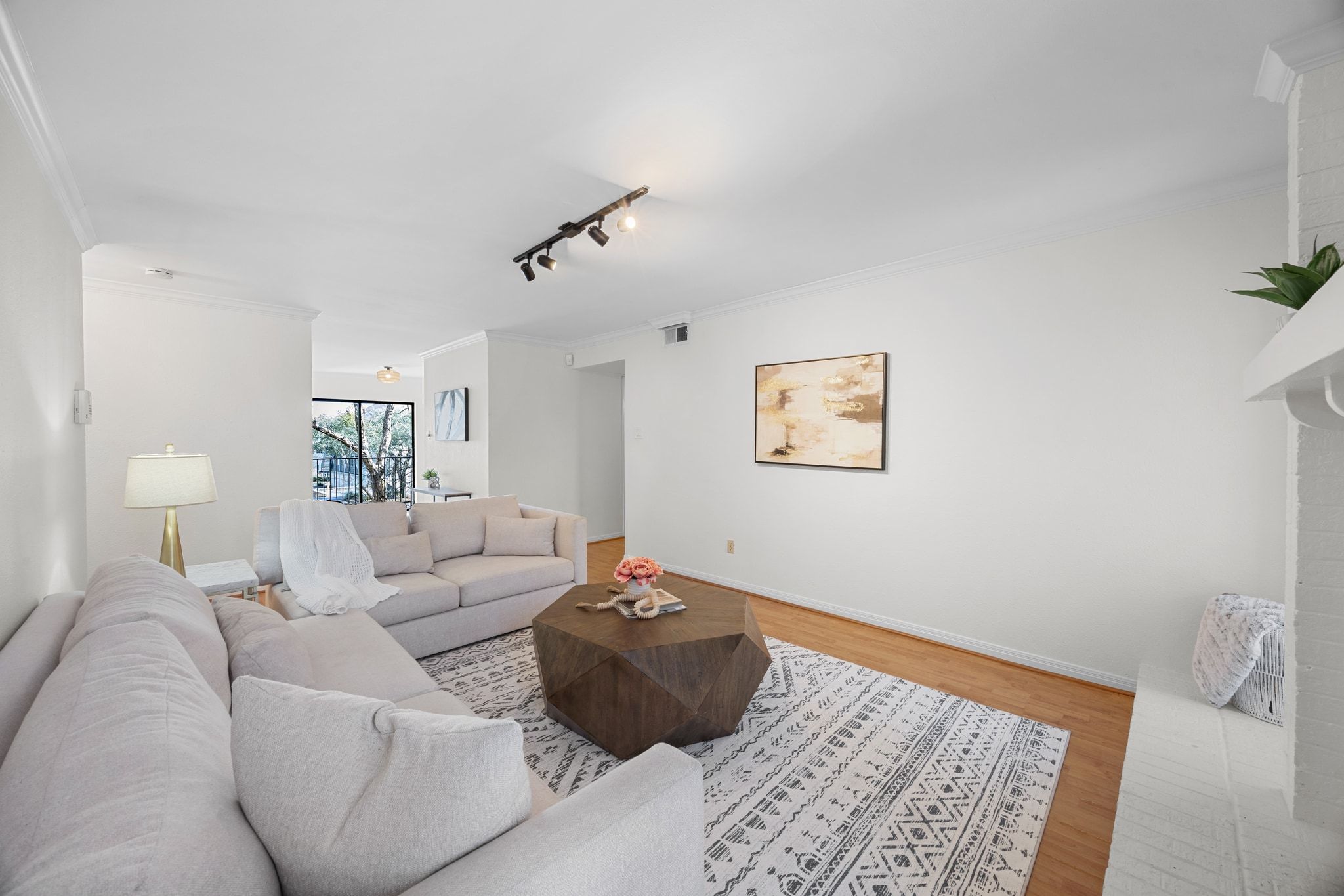 4159 Steck Avenue, Unit 258 Austin, TX 78759 - Photo 8 of 28 a living room with furniture and a lamp