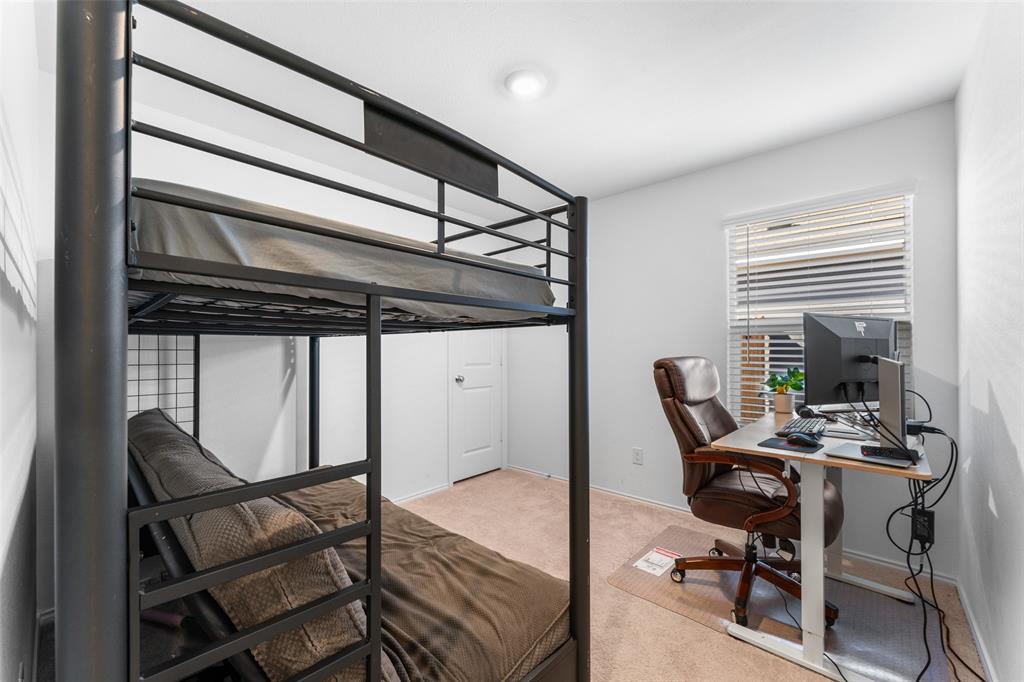 241 Thresher Lane Princeton, TX 75407 - Photo 18 of 33 a work room with furniture and a window