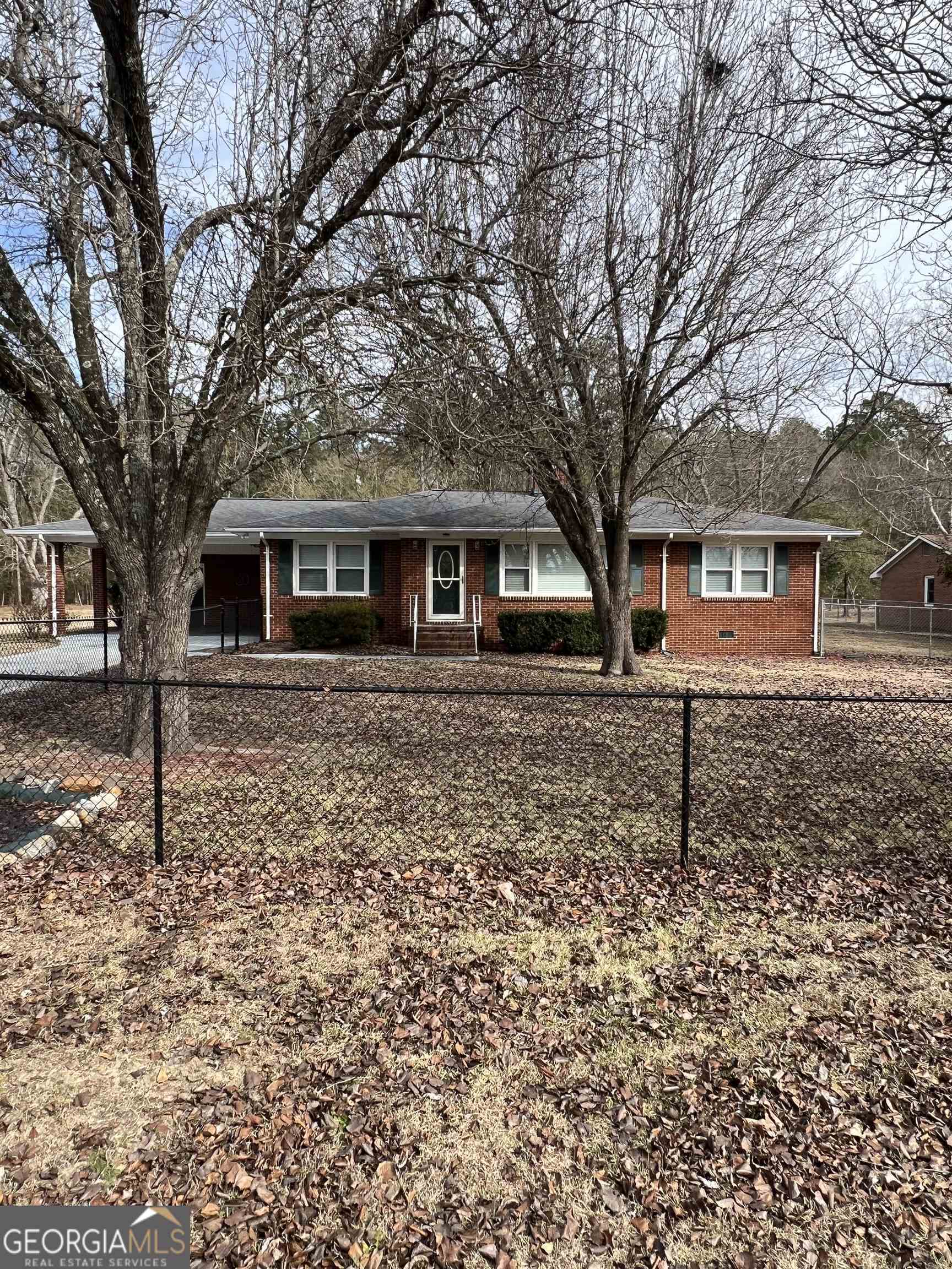 110 Alexander Street Chester, GA 31012 - Photo 1 of 1 front view of house with a yard