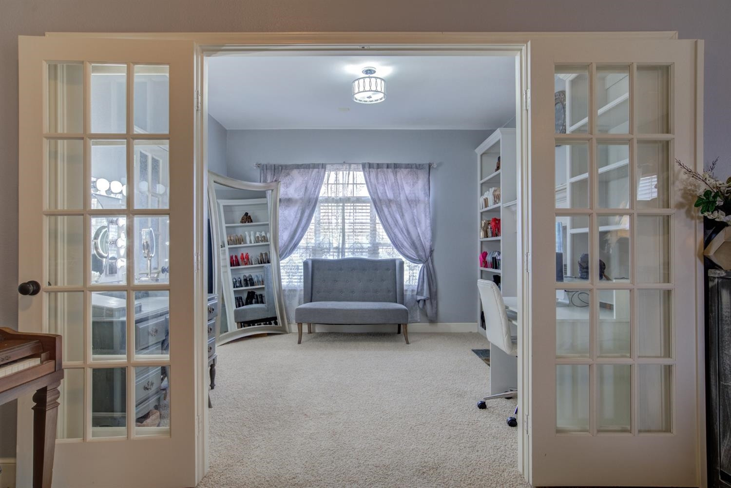 5904 110th Street Lubbock, TX 79424 - Photo 20 of 50 a bedroom with furniture and a window