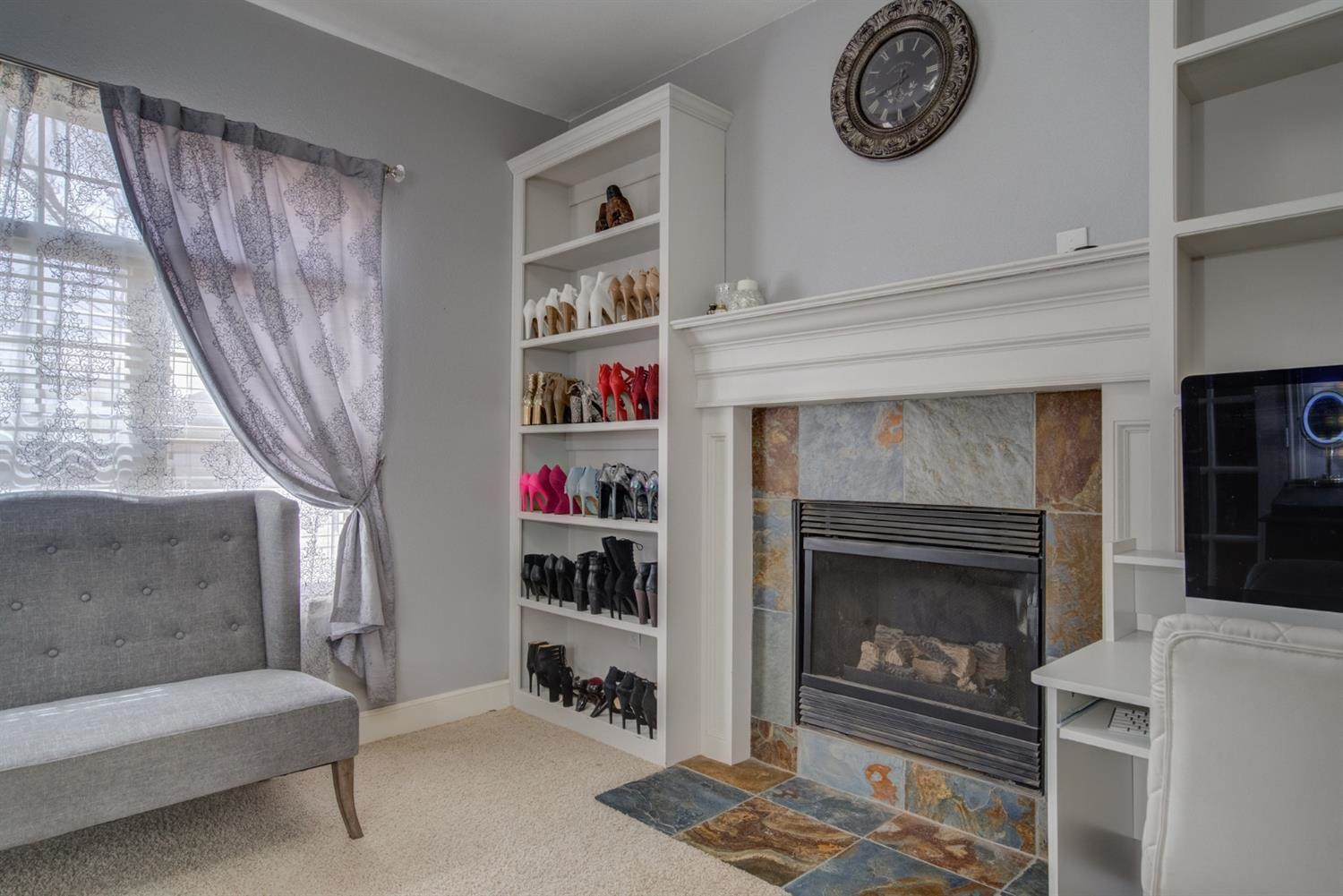 5904 110th Street Lubbock, TX 79424 - Photo 23 of 50 a living room with furniture and a fireplace