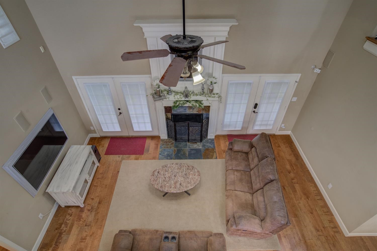 5904 110th Street Lubbock, TX 79424 - Photo 33 of 50 a living room with furniture and a fireplace